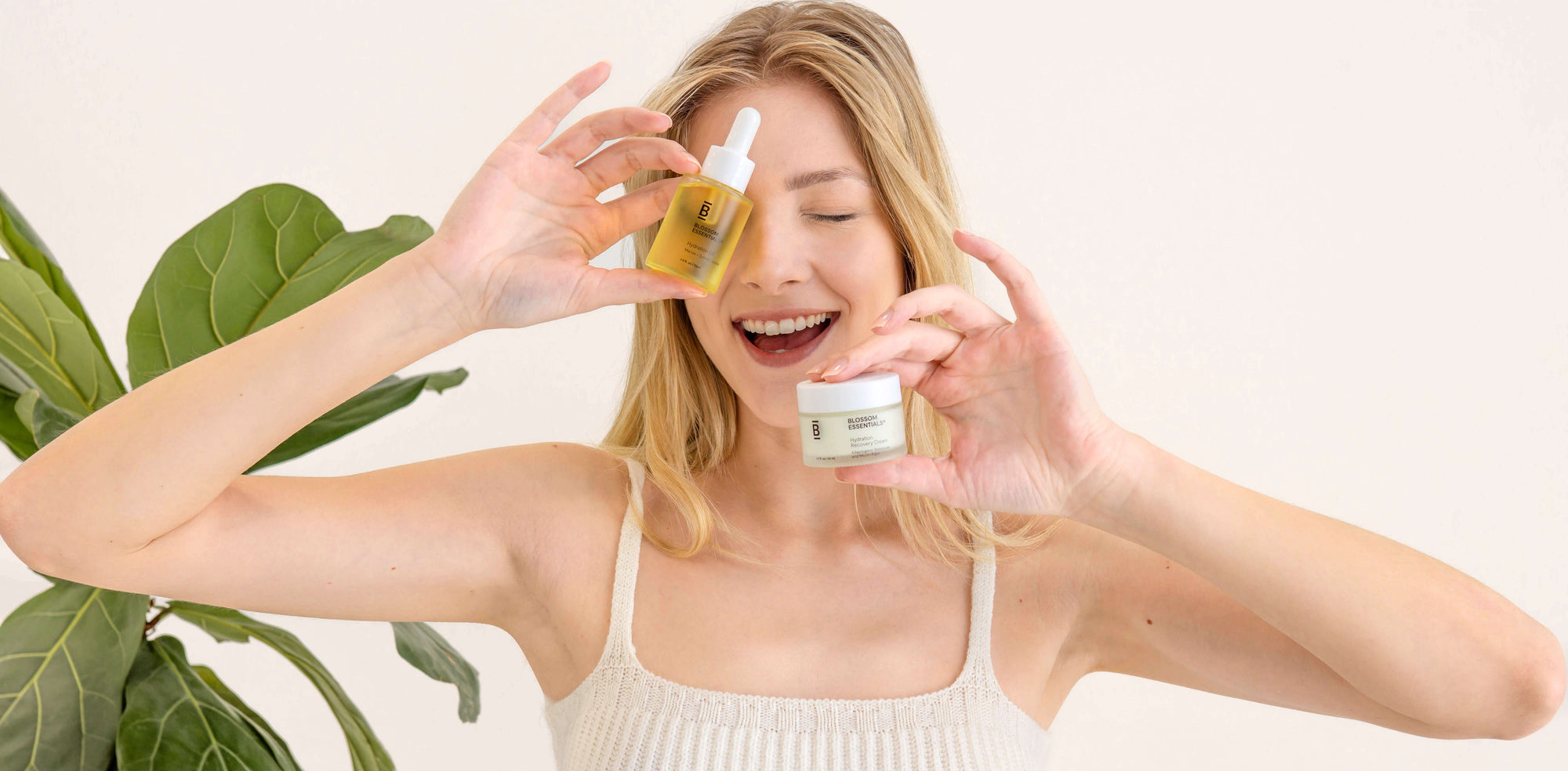 clarissa_with_ face oil and face cream over face and smiling