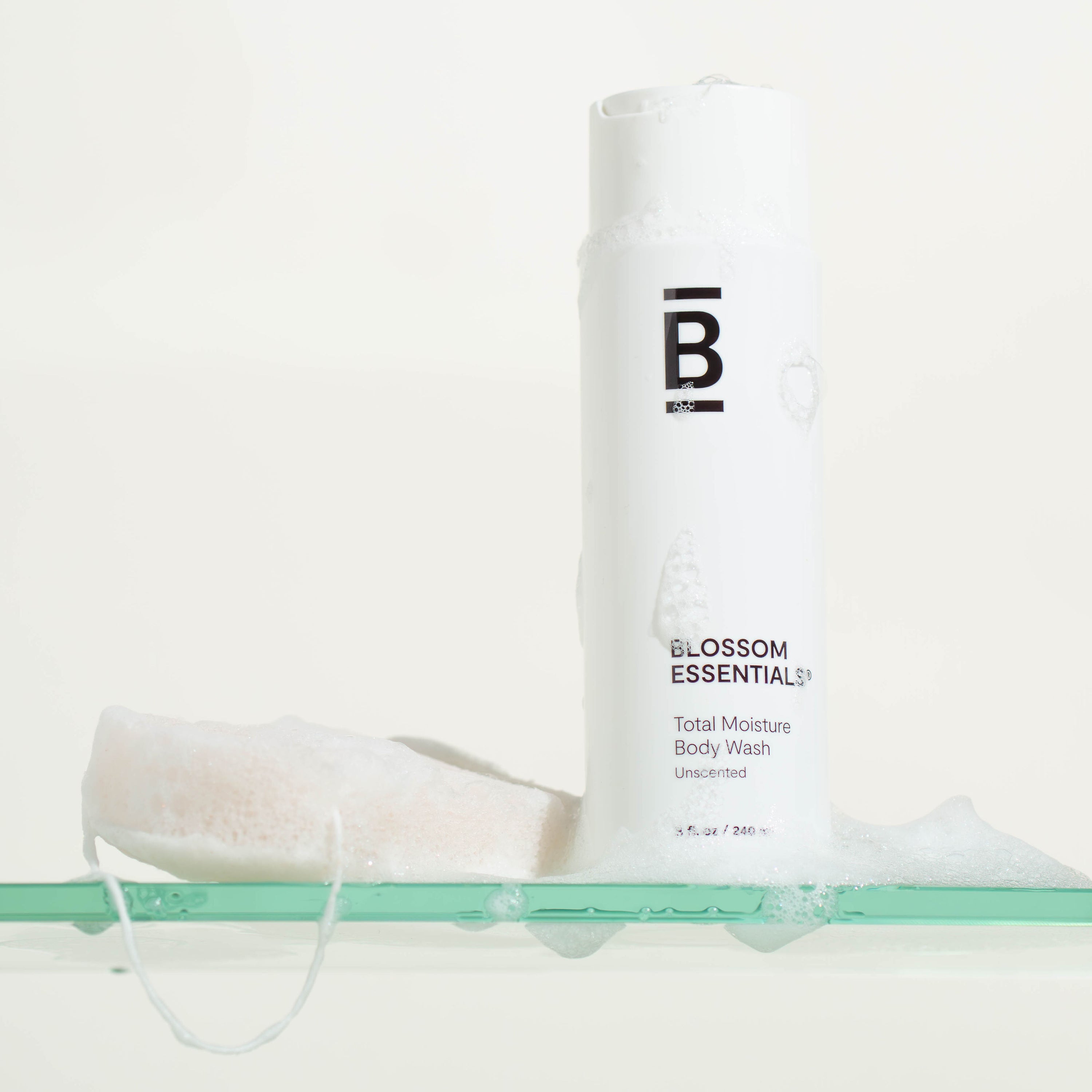 Gentle Body Cleansing Kit containing a Total Moisture Body Wash and all natural konjac sponge